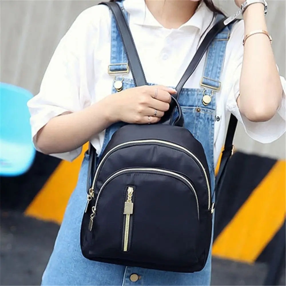 Mini mochila multifuncional oxford