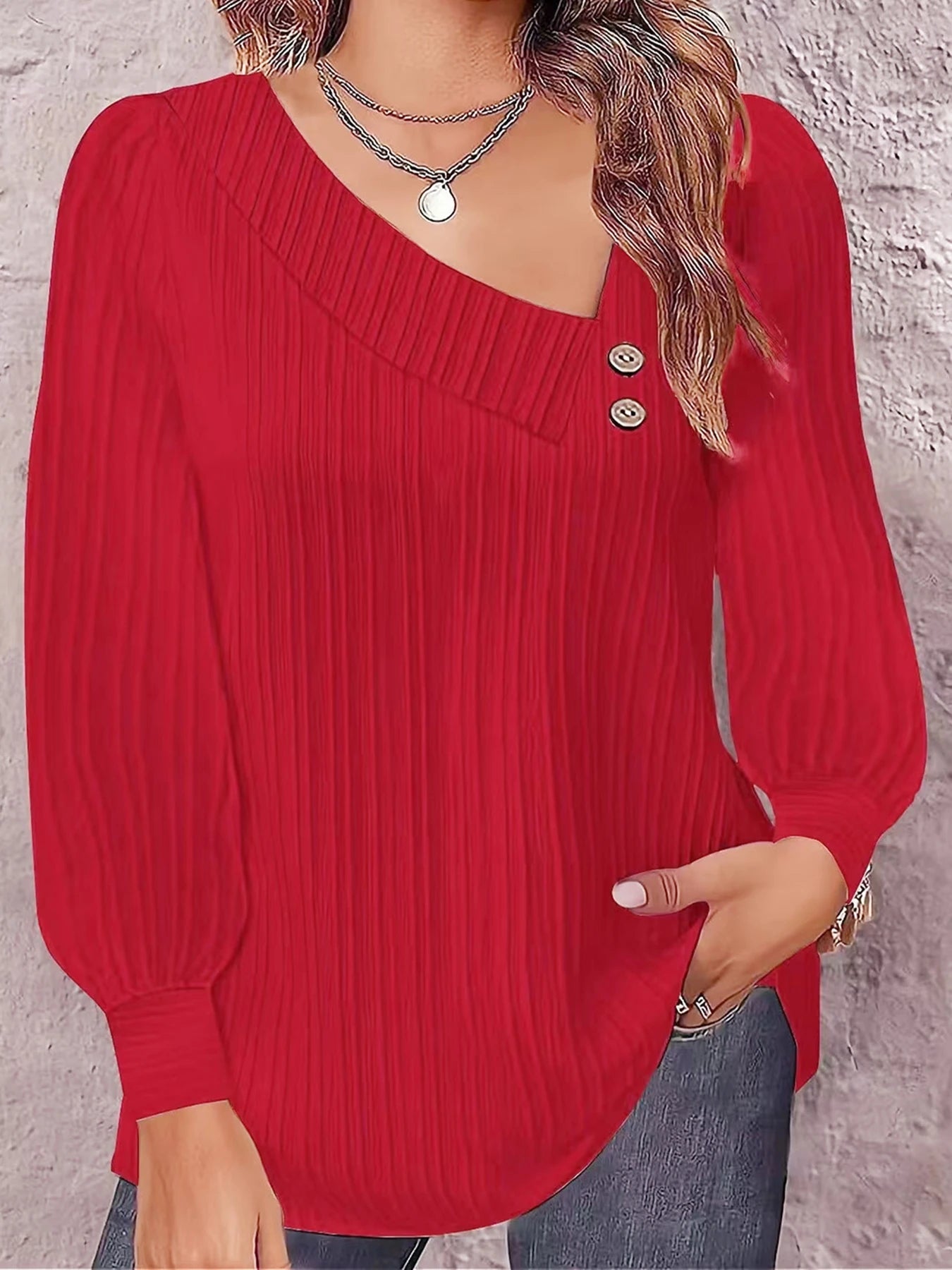 Blusa assimétrica decote V, manga longa canelada, botões